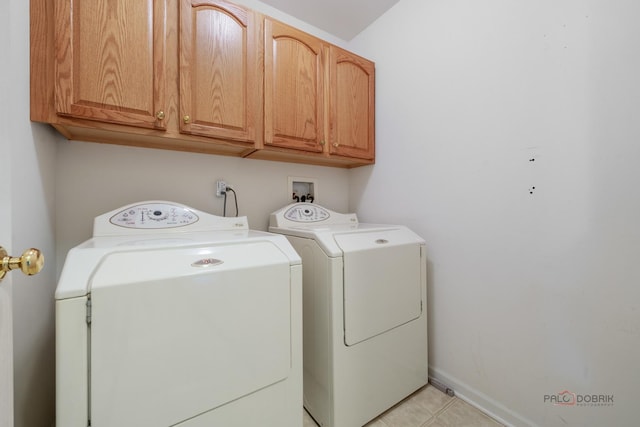 707 Wedgewood Trl, Mchenry, IL 60050 - laundry room featuring cabinet space, washer and clothes dryer, and light tile patterned floors
