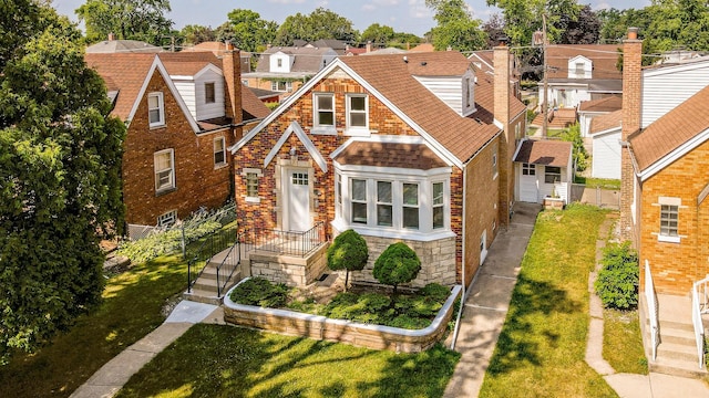 3020 77th Ave, Elmwood Park, IL 60707 - view of front of home featuring brick siding, roof with shingles, and a residential view