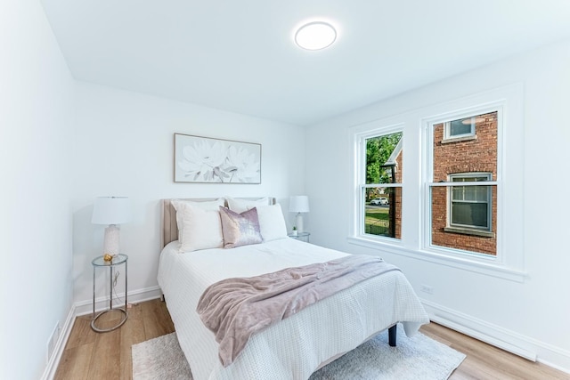 3020 77th Ave, Elmwood Park, IL 60707 - bedroom featuring light wood-style flooring
