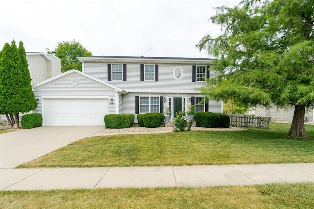3310 Stonebridge Dr, Bloomington, IL 61704 - colonial inspired home with an attached garage and concrete driveway
