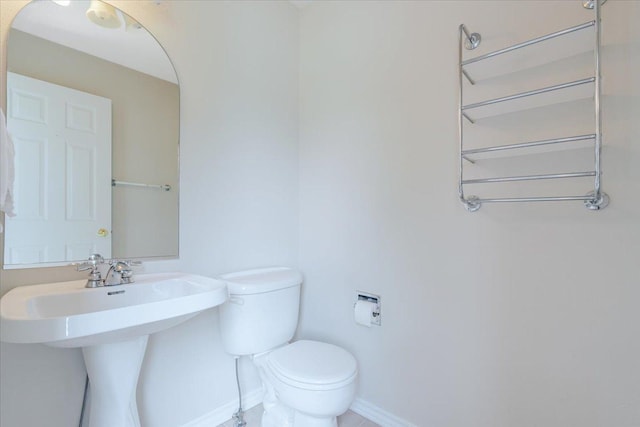 3310 Stonebridge Dr, Bloomington, IL 61704 - bathroom featuring toilet and baseboards