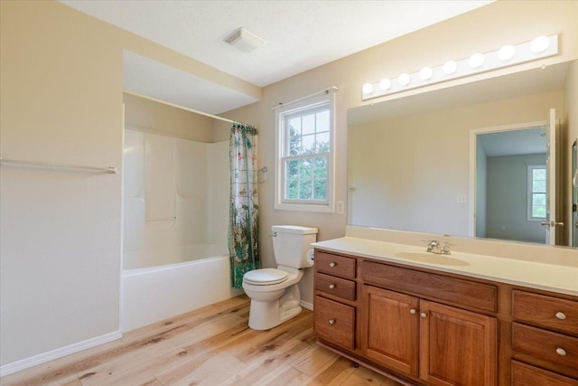 3310 Stonebridge Dr, Bloomington, IL 61704 - bathroom with wood finished floors, vanity, and shower / bath combo