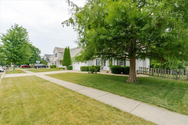 3310 Stonebridge Dr, Bloomington, IL 61704 - view of front facade featuring an attached garage and concrete driveway