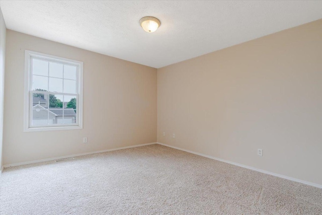 3310 Stonebridge Dr, Bloomington, IL 61704 - empty room featuring carpet and baseboards