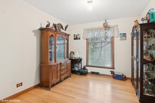 1615 E Miner St, Arlington Heights, IL 60004 - dining area featuring light wood-style flooring and baseboards