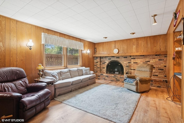 1615 E Miner St, Arlington Heights, IL 60004 - living area featuring wooden walls, light wood-type flooring, and a fireplace