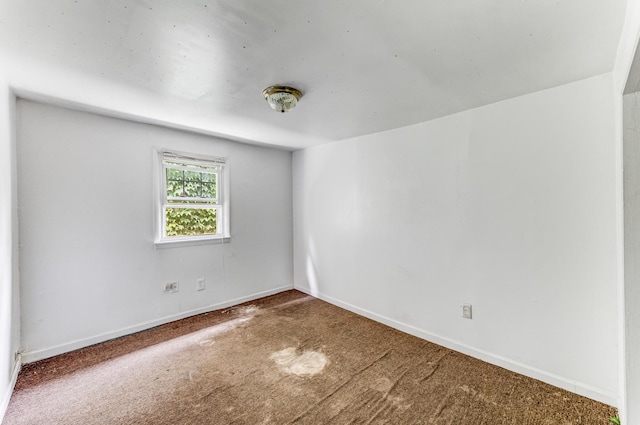 7807 S Burnham Ave, Chicago, IL 60649 - carpeted empty room featuring baseboards