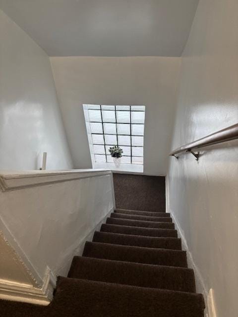 7807 S Burnham Ave, Chicago, IL 60649 - stairs with carpet and baseboards