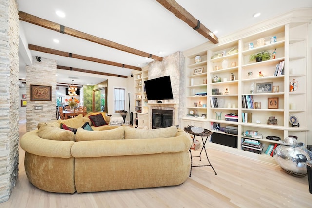 1530 W Monroe St, Chicago, IL 60607 - living room featuring beam ceiling, a fireplace, wood finished floors, and recessed lighting