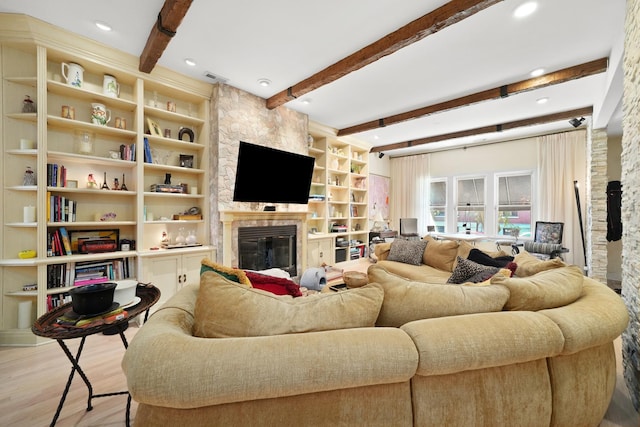 1530 W Monroe St, Chicago, IL 60607 - living room with wood finished floors, a fireplace, beamed ceiling, and recessed lighting