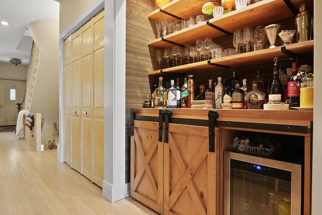 1530 W Monroe St, Chicago, IL 60607 - bar featuring light wood-style floors, beverage cooler, and recessed lighting