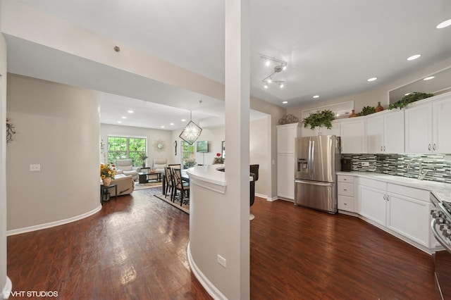 3125 Town Square Dr Unit 408, Rolling Meadows, IL 60008 - kitchen featuring stainless steel refrigerator with ice dispenser, dark wood-type flooring, open floor plan, light countertops, and recessed lighting