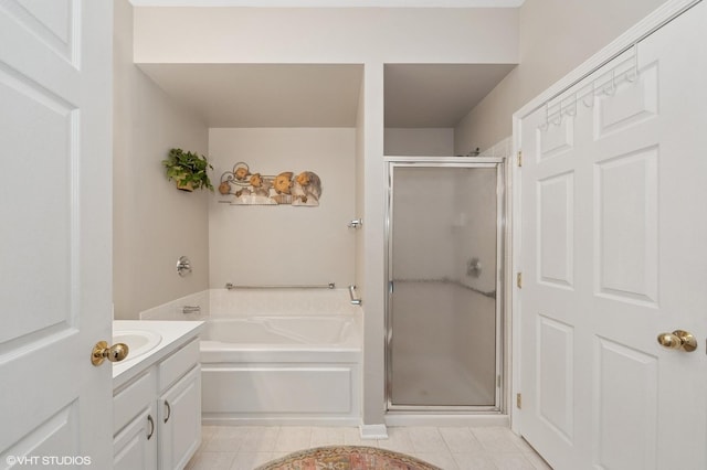3125 Town Square Dr Unit 408, Rolling Meadows, IL 60008 - full bath with a shower stall, a garden tub, vanity, and tile patterned floors