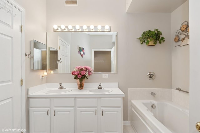 3125 Town Square Dr Unit 408, Rolling Meadows, IL 60008 - full bathroom with double vanity and a bath