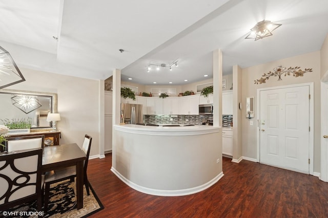 3125 Town Square Dr Unit 408, Rolling Meadows, IL 60008 - kitchen with stainless steel appliances, white cabinetry, tasteful backsplash, dark wood-style flooring, and light countertops