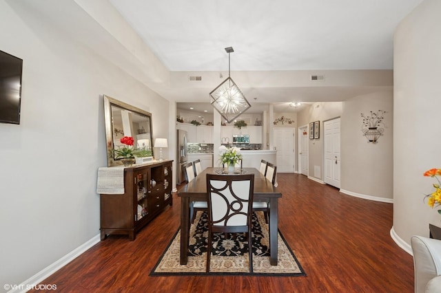 3125 Town Square Dr Unit 408, Rolling Meadows, IL 60008 - dining room featuring baseboards and dark wood-type flooring