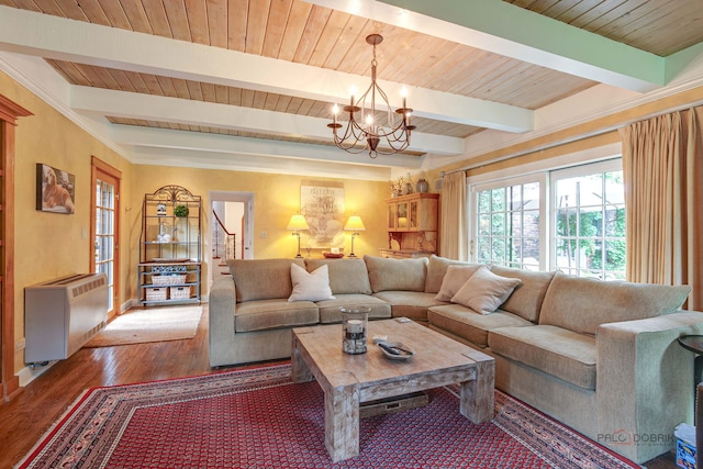 670 S Green Bay Rd, Lake Forest, IL 60045 - living room featuring wood finished floors, a chandelier, and a wooden ceiling with exposed beams