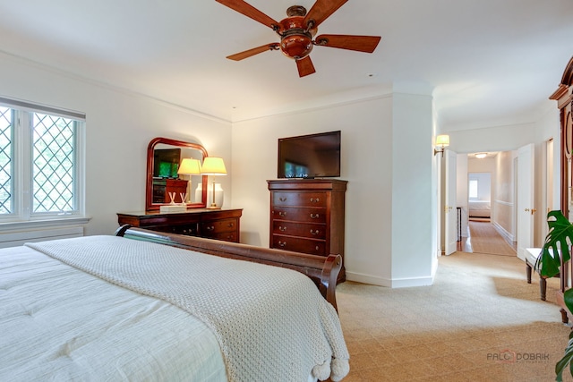 670 S Green Bay Rd, Lake Forest, IL 60045 - bedroom featuring light carpet, ornamental molding, and a ceiling fan