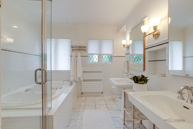 670 S Green Bay Rd, Lake Forest, IL 60045 - bathroom with a bath, tile walls, and a shower with door