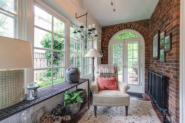 670 S Green Bay Rd, Lake Forest, IL 60045 - living area featuring brick wall and a fireplace
