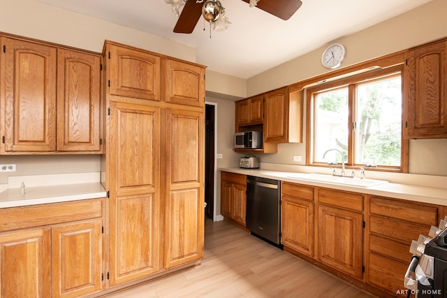 421 W Verret St, Elmhurst, IL 60126 - kitchen featuring stainless steel appliances, ceiling fan, light countertops, and light wood-type flooring