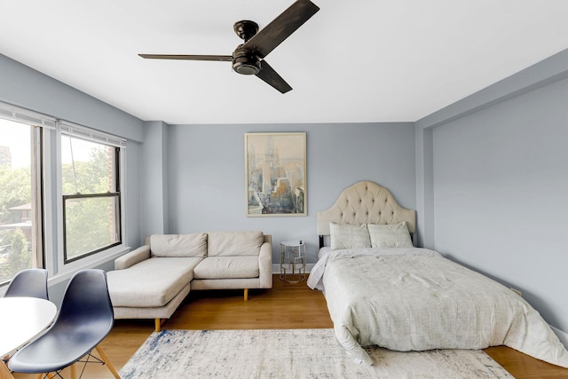 4880 N Marine Dr Unit 404, Chicago, IL 60640 - bedroom featuring wood finished floors and ceiling fan