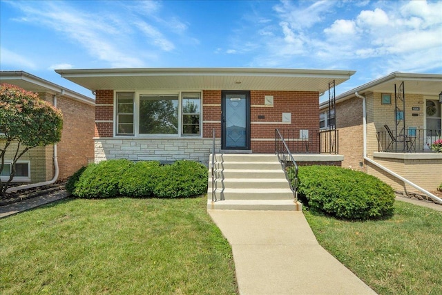 11340 S Drake Ave, Chicago, IL 60655 - view of front of home featuring a front lawn, covered porch, and stone siding
