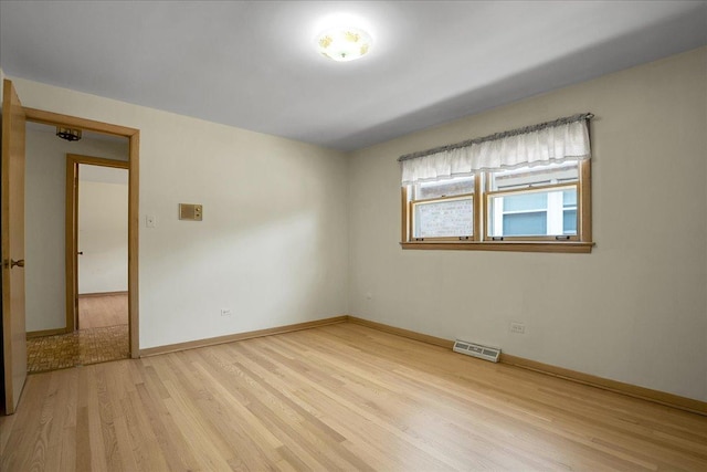 11340 S Drake Ave, Chicago, IL 60655 - empty room featuring light wood-style floors and baseboards