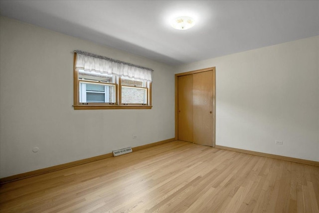 11340 S Drake Ave, Chicago, IL 60655 - spare room with light wood-style floors and baseboards