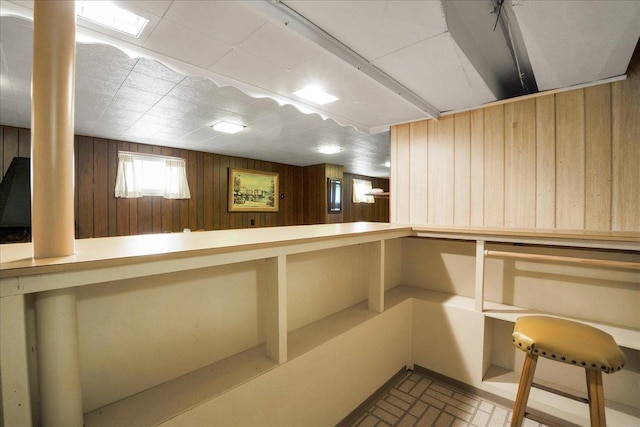 11340 S Drake Ave, Chicago, IL 60655 - basement featuring wooden walls and brick patterned flooring