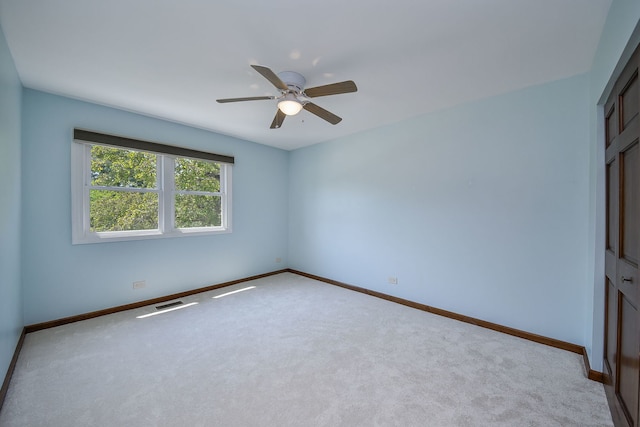 27W098 Walnut Dr, Winfield, IL 60190 - carpeted spare room featuring baseboards and a ceiling fan