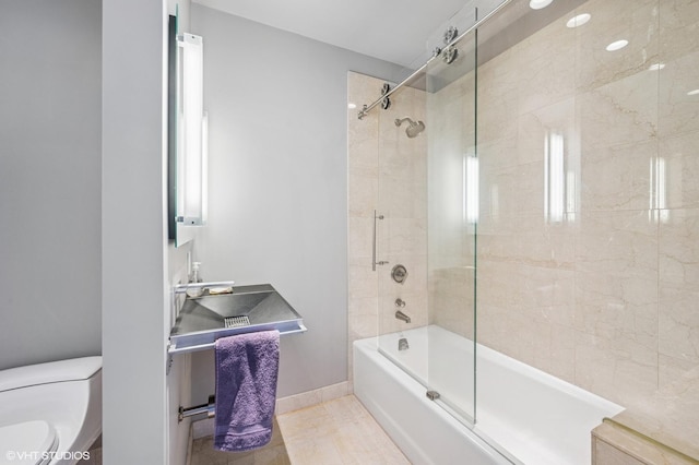 401 N Wabash Ave Unit 33K, Chicago, IL 60611 - bathroom featuring toilet and shower / bath combination with glass door