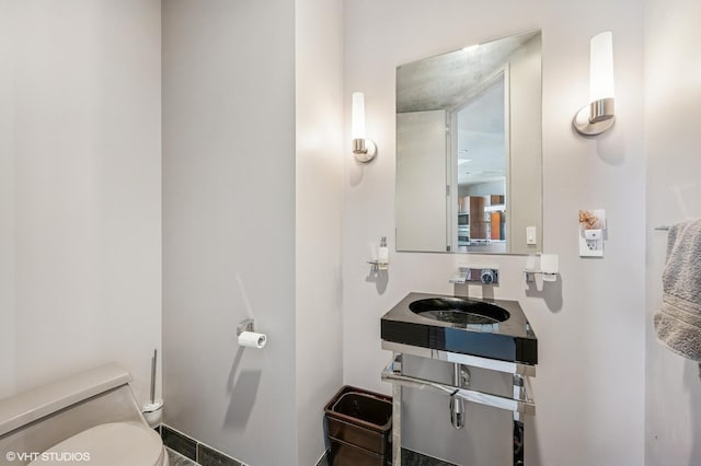 401 N Wabash Ave Unit 33K, Chicago, IL 60611 - half bath featuring a sink and toilet