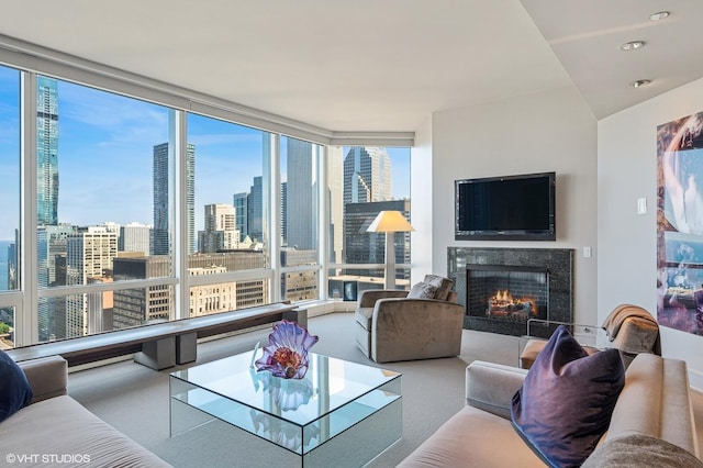 401 N Wabash Ave Unit 33K, Chicago, IL 60611 - carpeted living room featuring a fireplace, plenty of natural light, and expansive windows