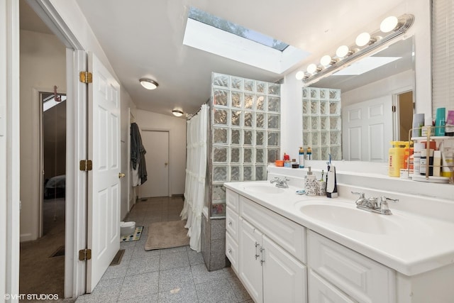 2076 N Campbell Ave, Chicago, IL 60647 - full bathroom featuring a skylight, double vanity, and a shower with curtain