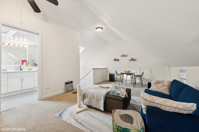 2076 N Campbell Ave, Chicago, IL 60647 - bedroom with lofted ceiling, ensuite bathroom, and light colored carpet