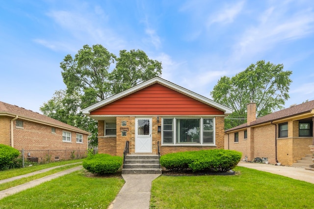 15620 Ingleside Ave, Dolton, IL 60419 - bungalow with a front lawn and brick siding