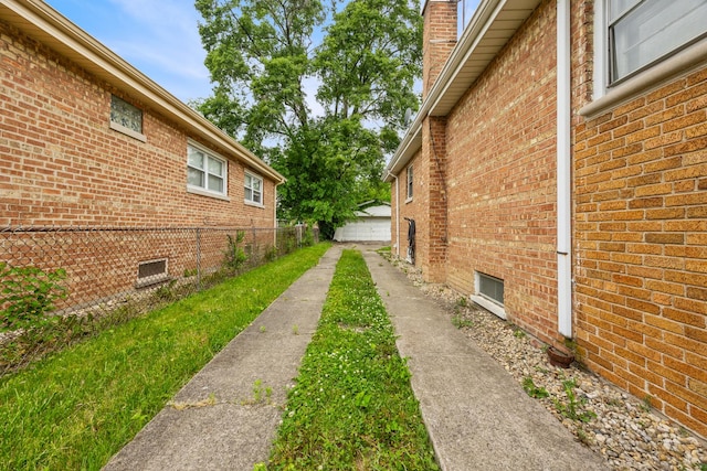 15620 Ingleside Ave, Dolton, IL 60419 - view of side of home with brick siding and a chimney