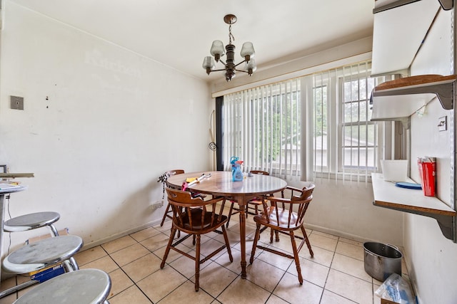 15620 Ingleside Ave, Dolton, IL 60419 - dining area featuring a chandelier and light tile patterned floors