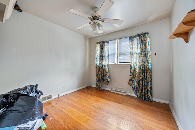 15620 Ingleside Ave, Dolton, IL 60419 - unfurnished room featuring light wood-style floors and ceiling fan