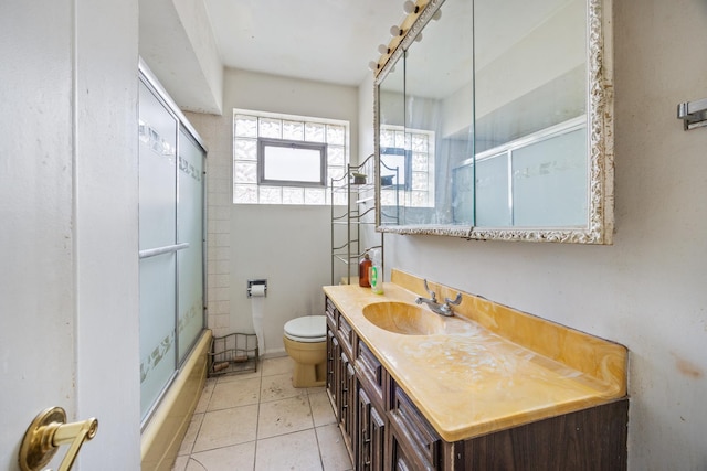 15620 Ingleside Ave, Dolton, IL 60419 - bathroom with vanity, tile patterned flooring, and enclosed tub / shower combo