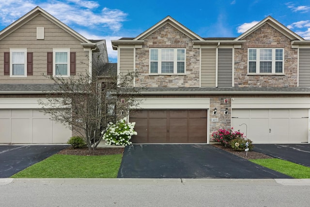 415 Highcroft Way, Lincolnshire, IL 60069 - multi unit property with stone siding, driveway, and an attached garage