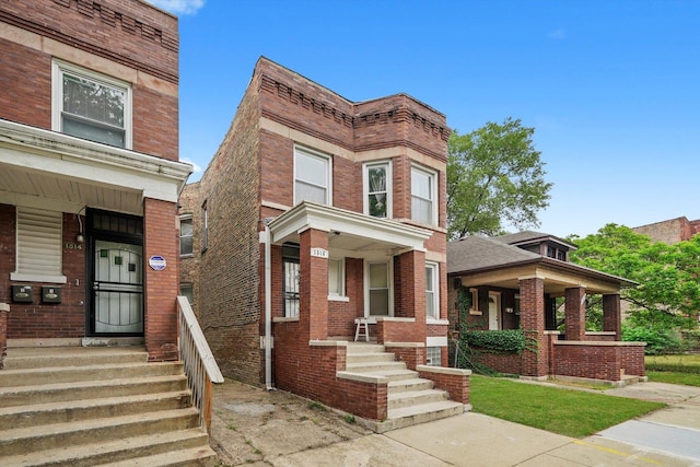 1516 E 74th Pl, Chicago, IL 60619 - multi unit property with covered porch and brick siding