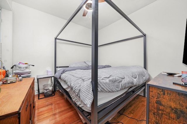 1516 E 74th Pl, Chicago, IL 60619 - bedroom with light wood-type flooring and ceiling fan