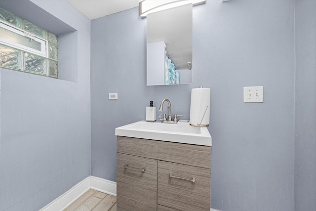 1516 E 74th Pl, Chicago, IL 60619 - full bath with vanity and wood finished floors