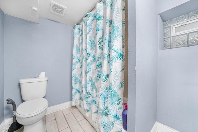 1516 E 74th Pl, Chicago, IL 60619 - full bath featuring toilet and shower / bathtub combination with curtain