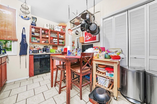 1516 E 74th Pl, Chicago, IL 60619 - dining space with baseboards and light tile patterned floors