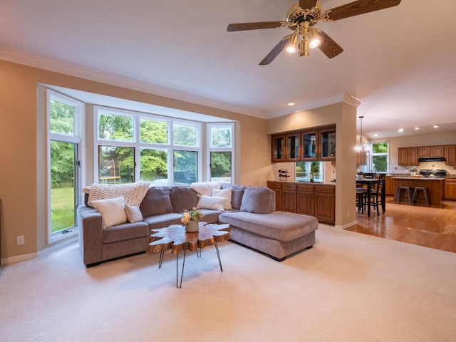 15955 Raintree Rd, Bloomington, IL 61705 - living room with crown molding, recessed lighting, ceiling fan, and light colored carpet