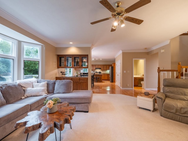 15955 Raintree Rd, Bloomington, IL 61705 - living room featuring light wood-style floors, ornamental molding, a ceiling fan, and recessed lighting