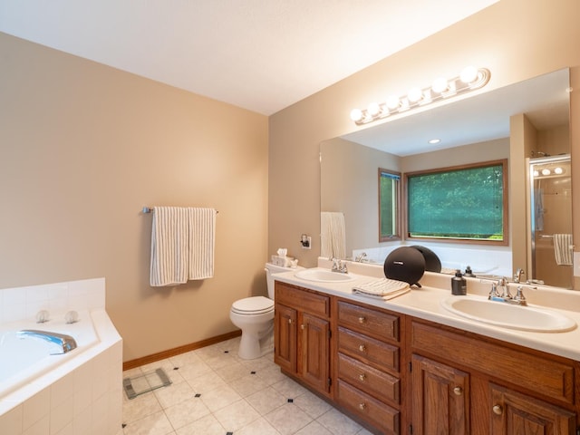 15955 Raintree Rd, Bloomington, IL 61705 - bathroom with a garden tub, double vanity, and a stall shower